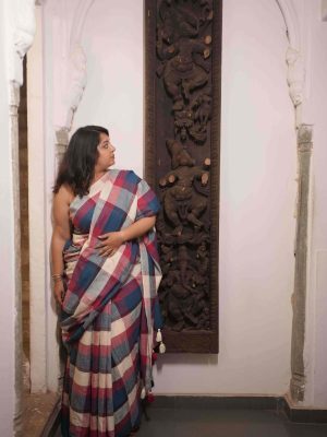 Patanga multicolor check cotton saree with multicolored tassels, includes solid blouse in a soft complementary color.